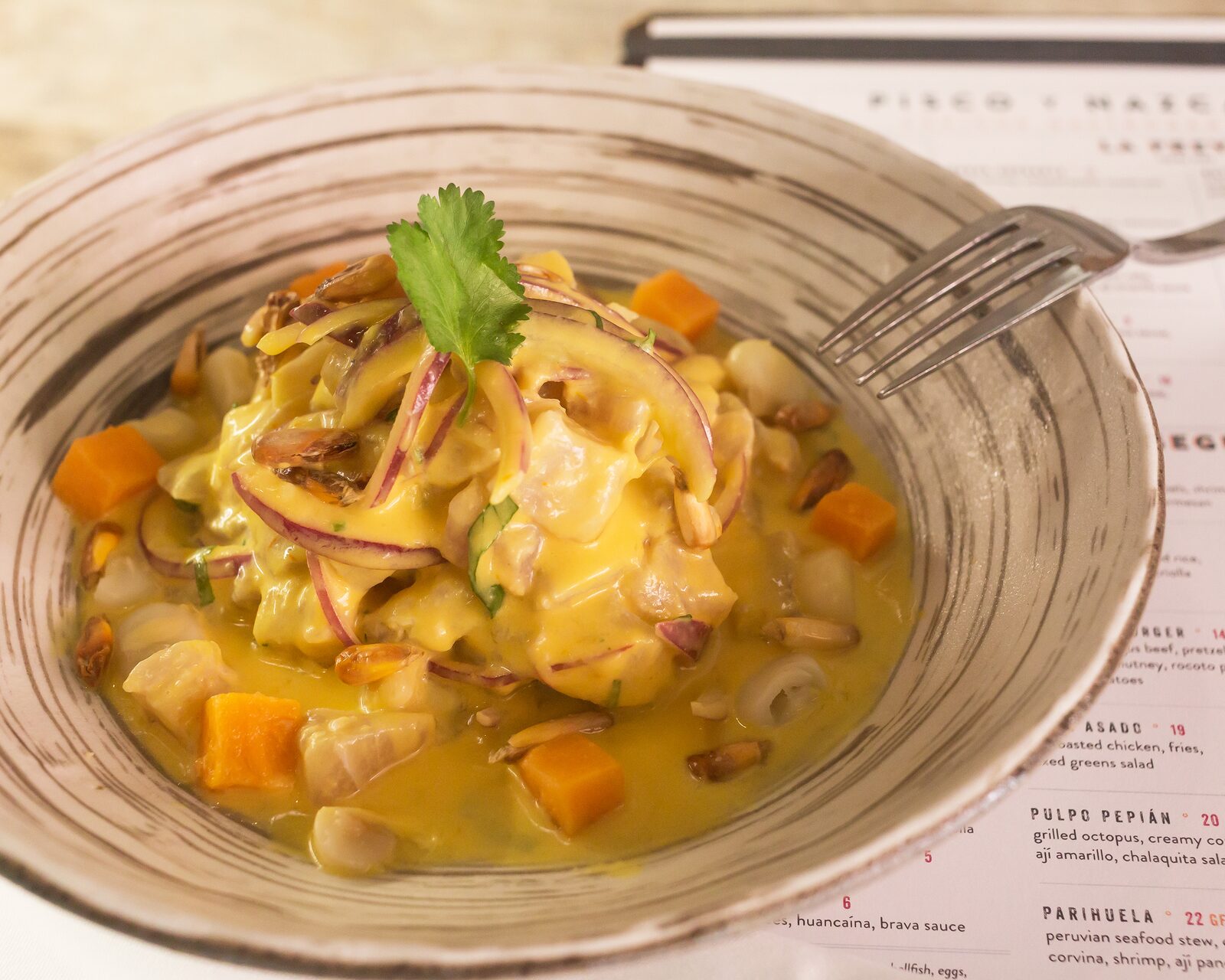 Miami Restaurant, Pisco y Nazca serves the most delicious ceviche.  Click to read about their other dishes on the menu or pin to save for later!