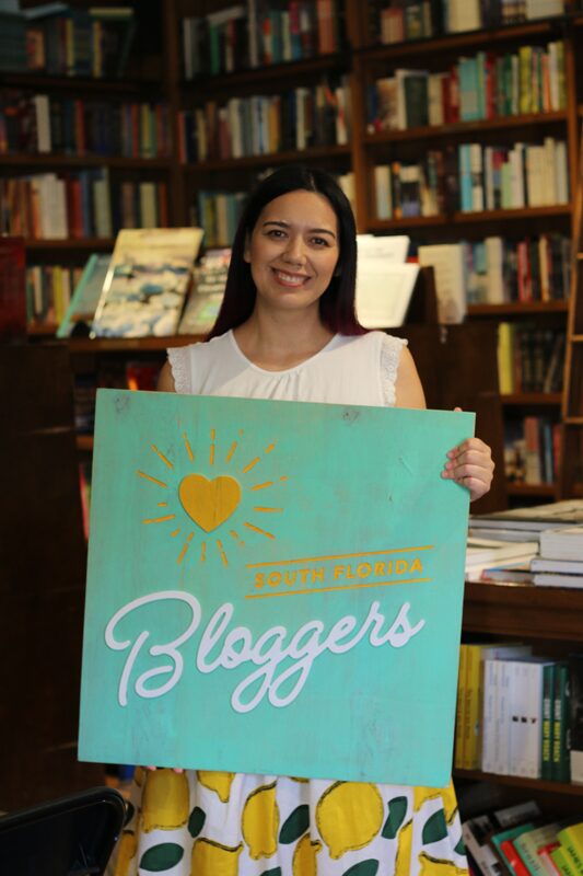 Paola Mendez speaks at the South Florida Mom Bloggers' and South Florida Bloggers' November 2019 Meetup
